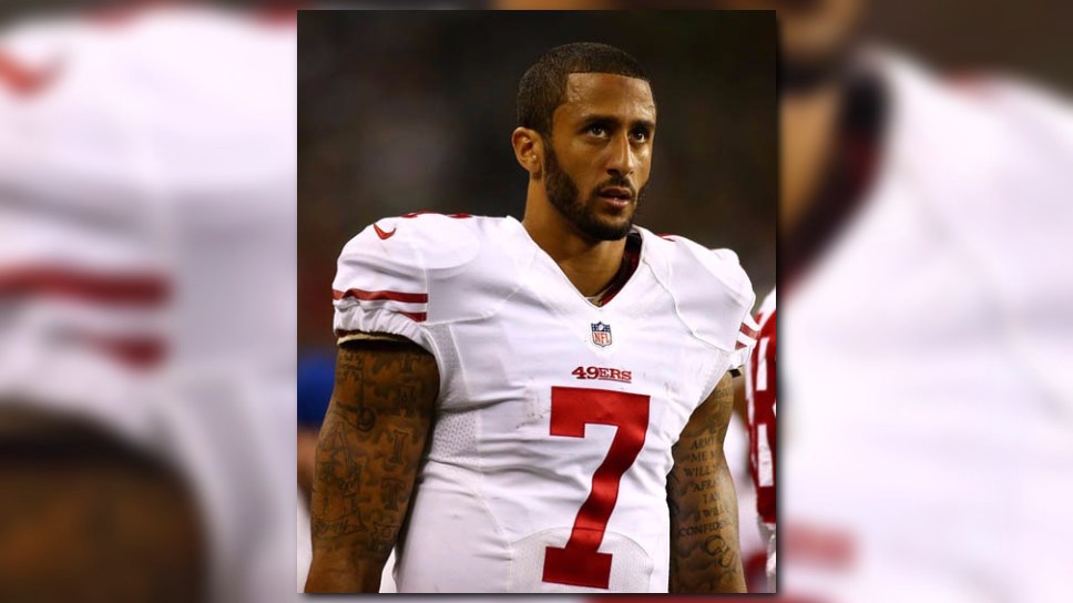 49ers QB Colin Kaepernick refuses to stand during national anthem